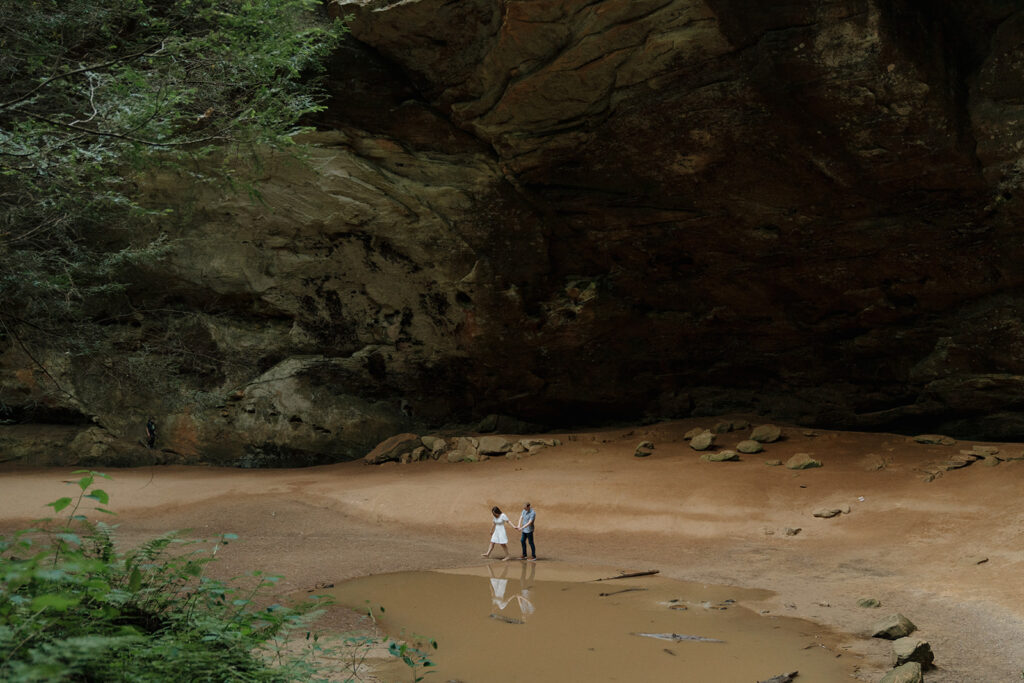 Couple explores Hocking Hills State Park during engagement photo session